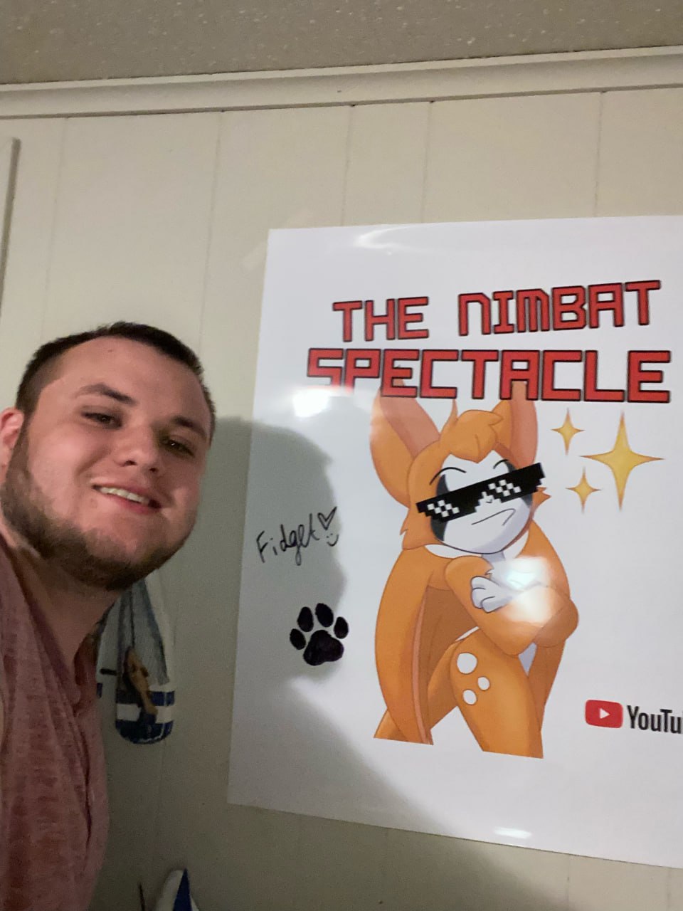 The Nimbat Spectacle fan with poster