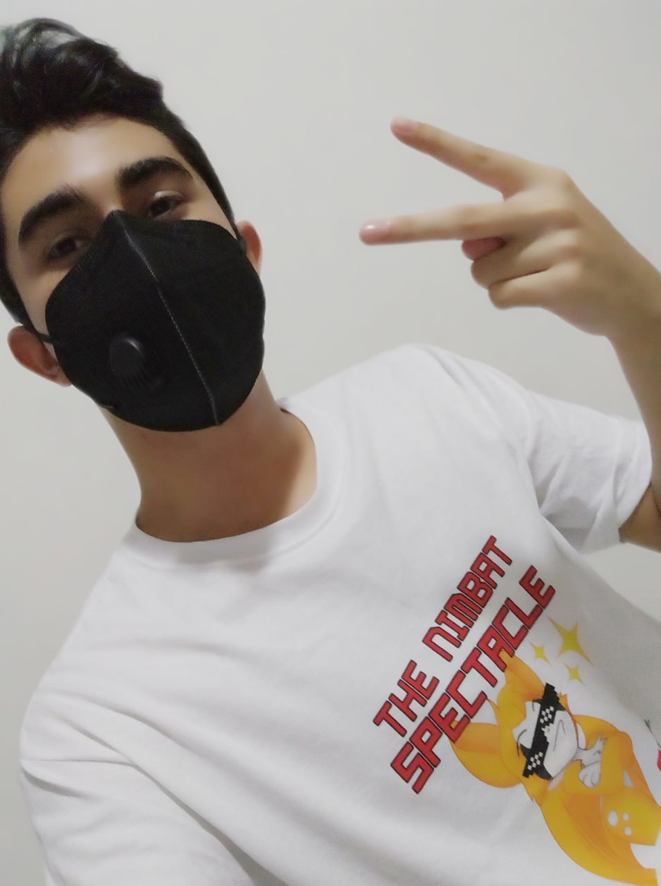 The Nimbat Spectacle T-Shirt worn by fan